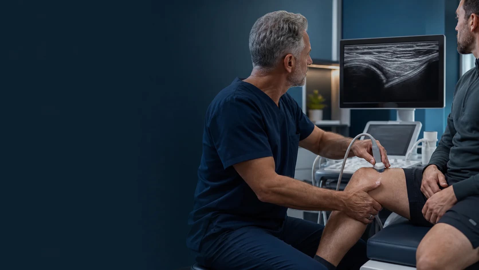 Clinician performing an ultrasound assessment of a knee ligament
